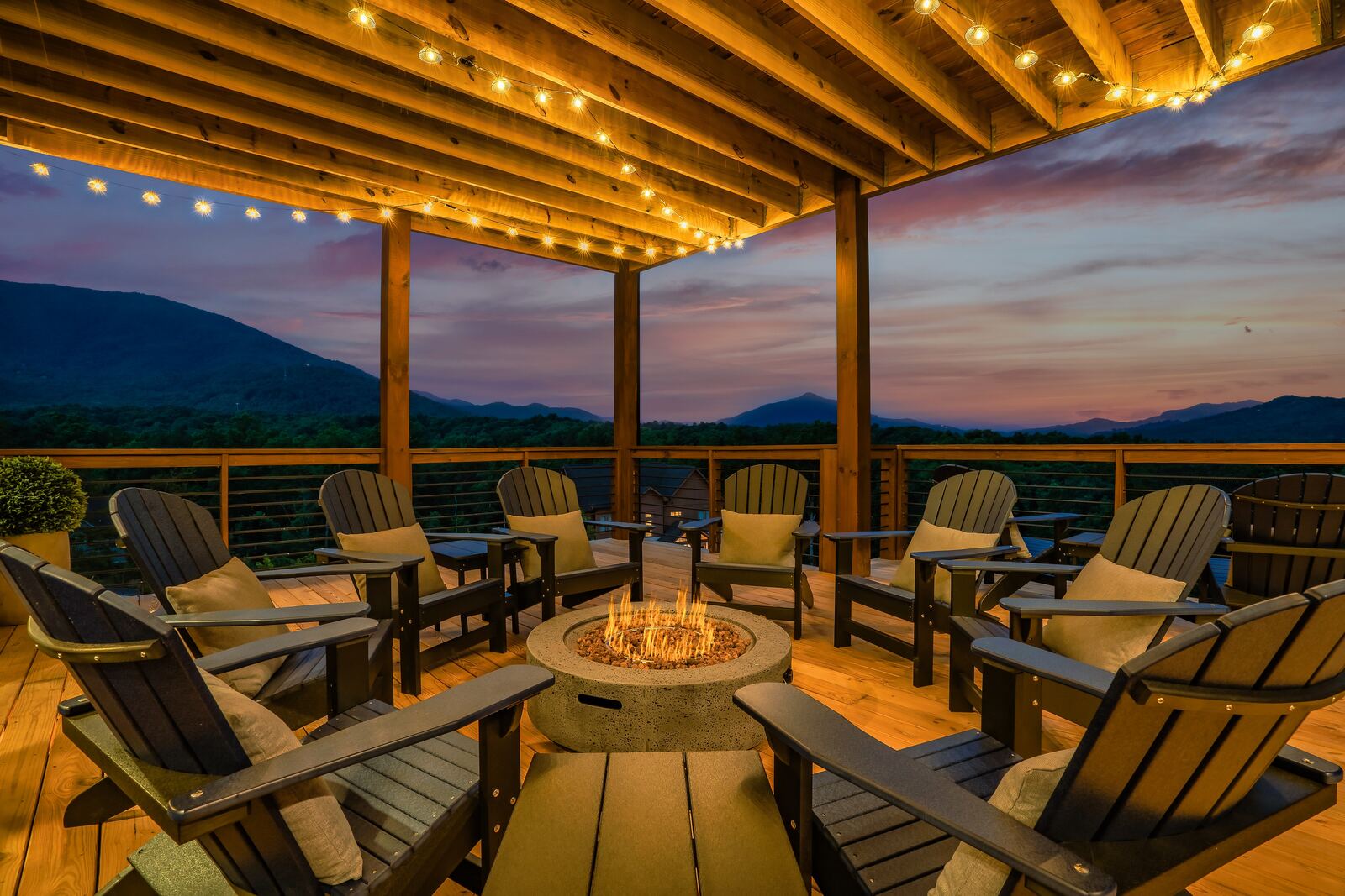 Outdoor fire pit lounge at sunset