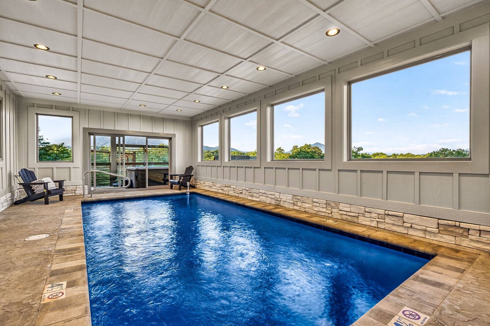 Indoor heated pool with mountain views